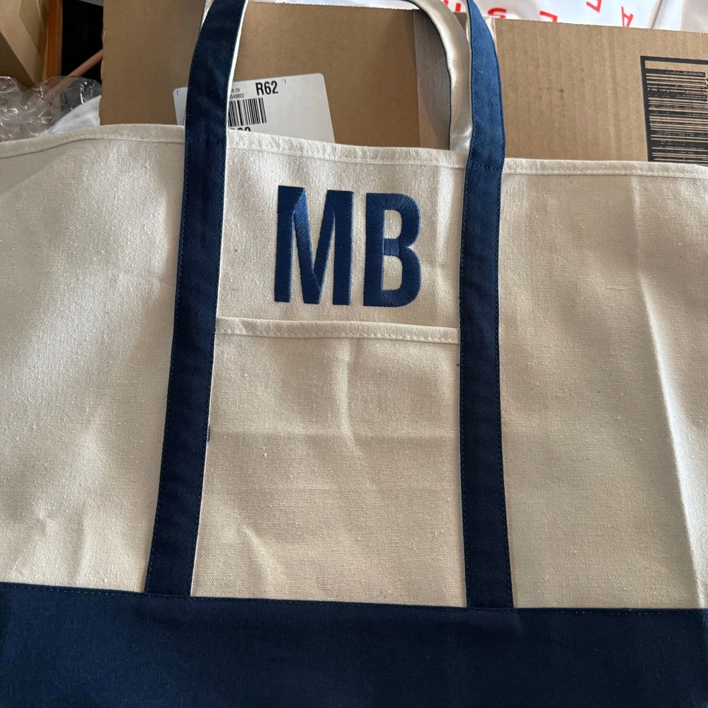 Cream and navy tote bag with MB monogram
