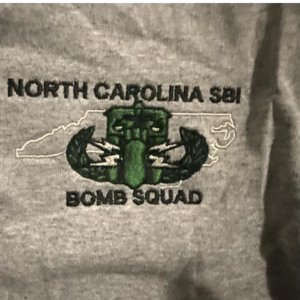 North Carolina SBI Bomb Squad embroidery detail on gray fabric